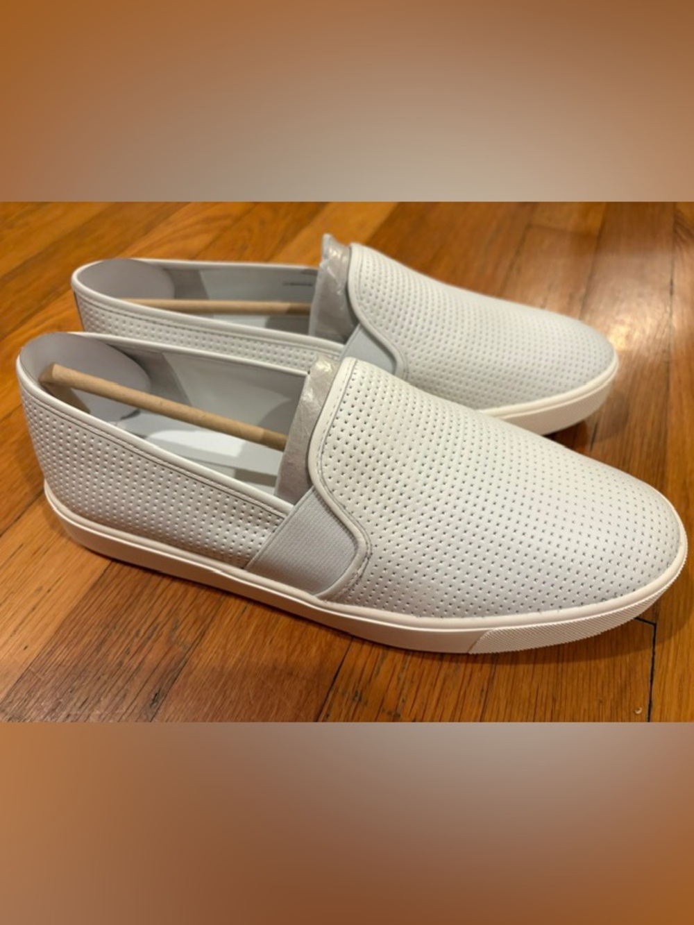 NWT Vince white perforated leather slip on sneakers. Style is Blair. Size 9M.